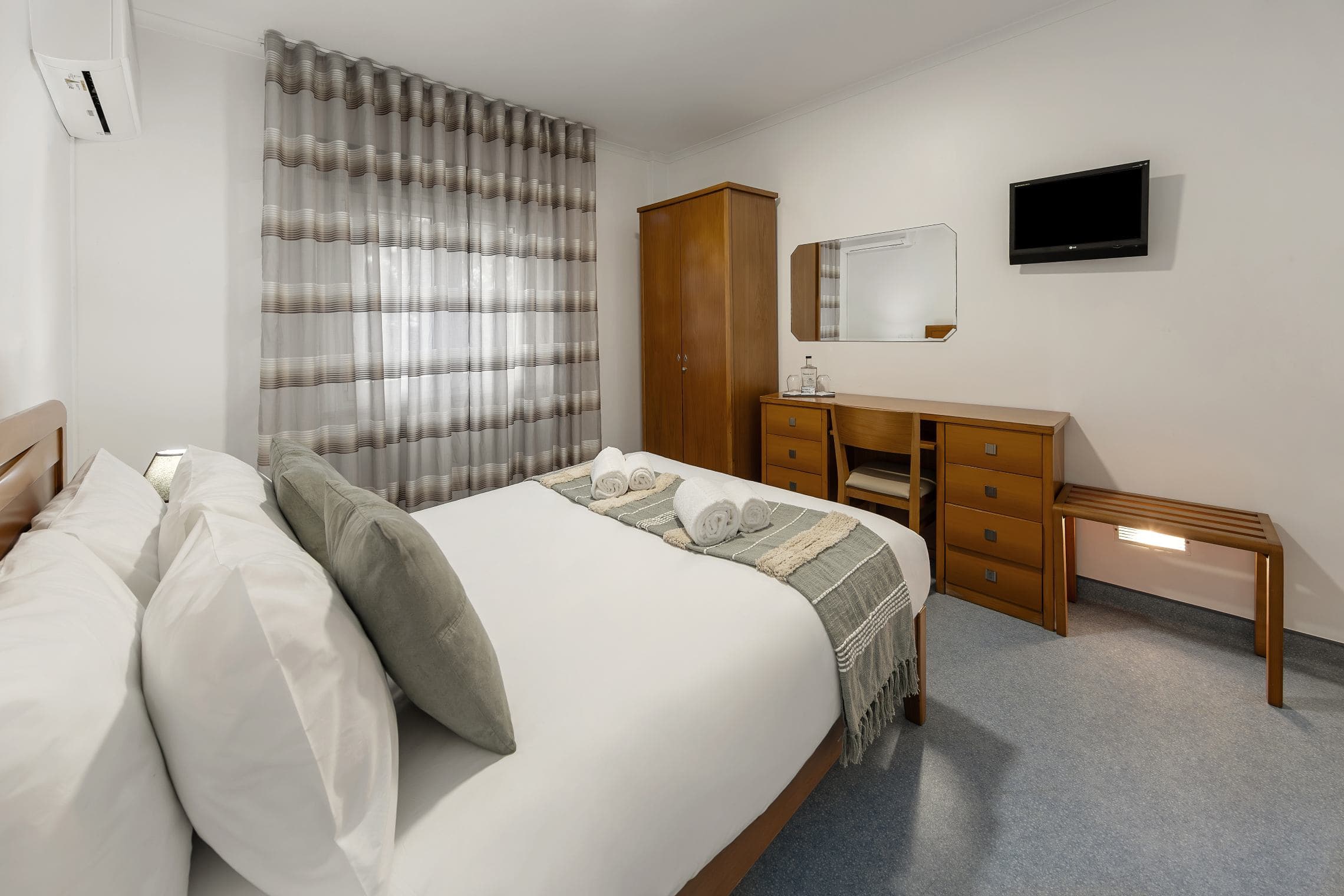 Pine View Room interior with twin bed layout